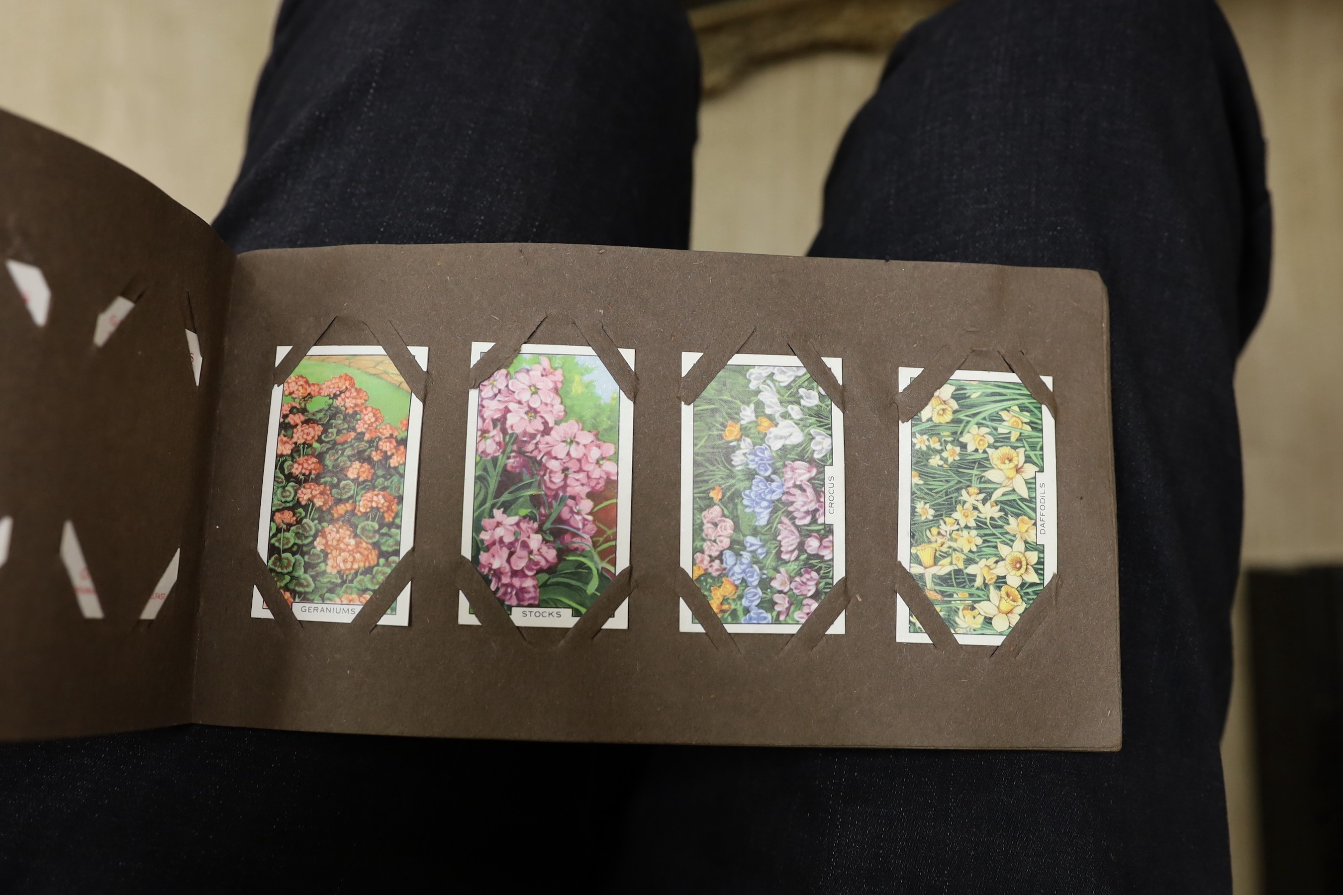 A quantity of cigarette and postcards